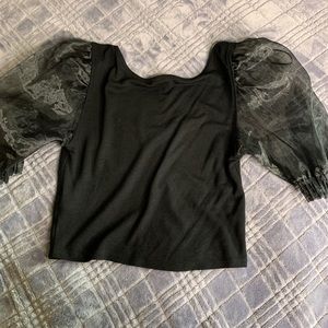 Top with dramatic sleeves